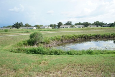 This attached home is located in Kings Point, one of Florida's on Falcon Watch Golf Club in Florida - for sale on GolfHomes.com, golf home, golf lot