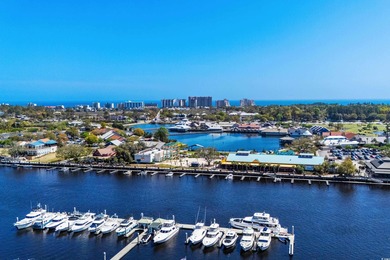 This beautiful three bedroom two bathroom furnished end unit is on Barefoot Resort and Golf Club  in South Carolina - for sale on GolfHomes.com, golf home, golf lot
