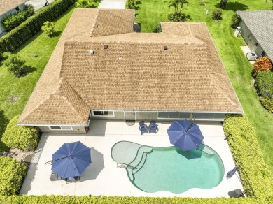 This beautifully updated 3 bedroom, 2 bath pool home is truly on Heritage Ridge Golf Club in Florida - for sale on GolfHomes.com, golf home, golf lot