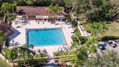 This attached home is located in Kings Point, one of Florida's on Falcon Watch Golf Club in Florida - for sale on GolfHomes.com, golf home, golf lot