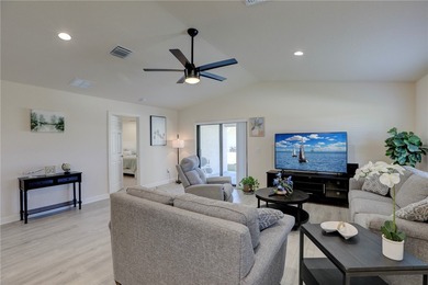 Easy Life. Lasting Style. Nearly new concrete block home in a on Spanish Lakes Country Club in Florida - for sale on GolfHomes.com, golf home, golf lot