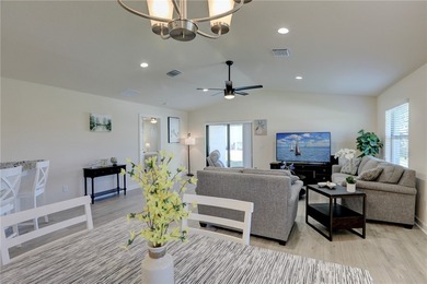 Easy Life. Lasting Style. Nearly new concrete block home in a on Spanish Lakes Country Club in Florida - for sale on GolfHomes.com, golf home, golf lot