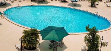 This attached home is located in Kings Point, one of Florida's on Falcon Watch Golf Club in Florida - for sale on GolfHomes.com, golf home, golf lot