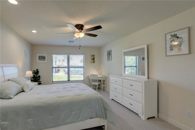 Easy Life. Lasting Style. Nearly new concrete block home in a on Spanish Lakes Country Club in Florida - for sale on GolfHomes.com, golf home, golf lot