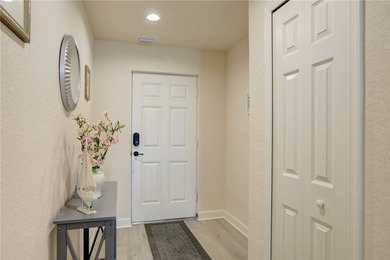 Easy Life. Lasting Style. Nearly new concrete block home in a on Spanish Lakes Country Club in Florida - for sale on GolfHomes.com, golf home, golf lot