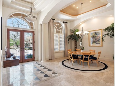 Positioned along the stunning 4th fairway of the renowned on Isleworth Golf and Country Club in Florida - for sale on GolfHomes.com, golf home, golf lot