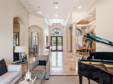 Positioned along the stunning 4th fairway of the renowned on Isleworth Golf and Country Club in Florida - for sale on GolfHomes.com, golf home, golf lot