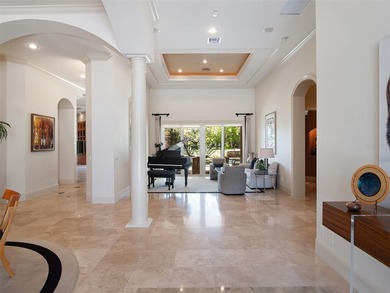 Positioned along the stunning 4th fairway of the renowned on Isleworth Golf and Country Club in Florida - for sale on GolfHomes.com, golf home, golf lot