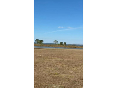 INVEST and WAIT or Build your dream home on this spacious .55 on Indian Lake Estates Golf and Country Club in Florida - for sale on GolfHomes.com, golf home, golf lot