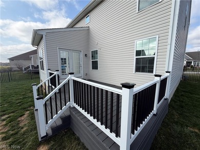 Welcome to your dream home! Tucked away in a charming cul-de-sac on Grey Hawk Golf Club in Ohio - for sale on GolfHomes.com, golf home, golf lot