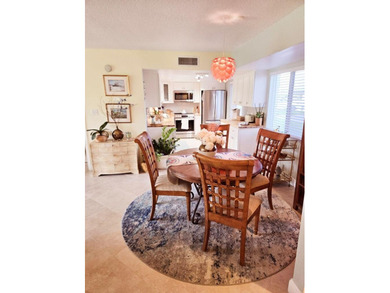 Beautifully updated 2 bedroom, 2 bath, 1st floor, furnished on Ocean Village Golf Course in Florida - for sale on GolfHomes.com, golf home, golf lot