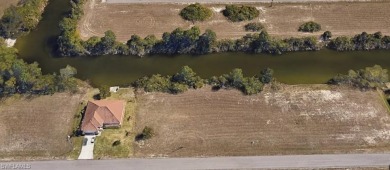 VACANT WATERFRONT LOT.  Buy and Build or Hold for Investment in on Del Tura Golf and Country Club in Florida - for sale on GolfHomes.com, golf home, golf lot