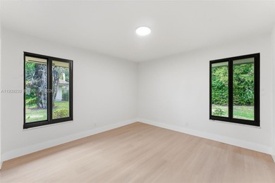 Beautiful, fully remodeled residence located in the heart of on PGA National Golf Club in Florida - for sale on GolfHomes.com, golf home, golf lot