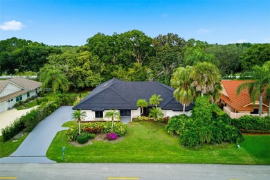 Beautiful, fully remodeled residence located in the heart of on PGA National Golf Club in Florida - for sale on GolfHomes.com, golf home, golf lot
