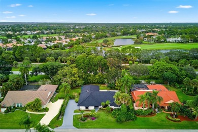 Beautiful, fully remodeled residence located in the heart of on PGA National Golf Club in Florida - for sale on GolfHomes.com, golf home, golf lot
