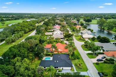 Beautiful, fully remodeled residence located in the heart of on PGA National Golf Club in Florida - for sale on GolfHomes.com, golf home, golf lot