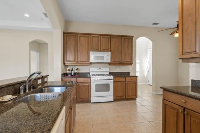 This lovely home boasts 2 master suites both overlooking on Scepter Golf Club in Florida - for sale on GolfHomes.com, golf home, golf lot