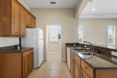 This lovely home boasts 2 master suites both overlooking on Scepter Golf Club in Florida - for sale on GolfHomes.com, golf home, golf lot