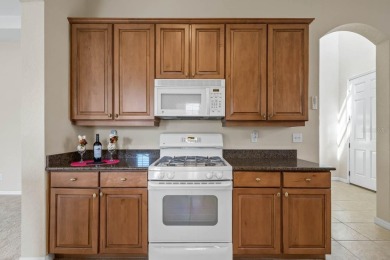 This lovely home boasts 2 master suites both overlooking on Scepter Golf Club in Florida - for sale on GolfHomes.com, golf home, golf lot