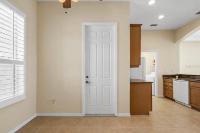 This lovely home boasts 2 master suites both overlooking on Scepter Golf Club in Florida - for sale on GolfHomes.com, golf home, golf lot
