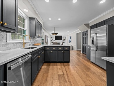 Take a tour of this inviting, gorgeously renovated home with a on The Pines At Elizabeth City in North Carolina - for sale on GolfHomes.com, golf home, golf lot