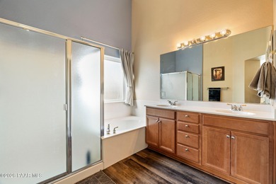 Tucked within the gated Prescott Lakes community and perfectly on Prescott Lakes Golf and Country Club in Arizona - for sale on GolfHomes.com, golf home, golf lot