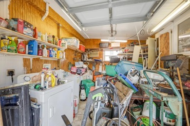 This charming 2-bedroom, 2-bathroom home is situated on a on Maple Leaf Golf and Country Club in Florida - for sale on GolfHomes.com, golf home, golf lot