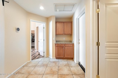 Tucked within the gated Prescott Lakes community and perfectly on Prescott Lakes Golf and Country Club in Arizona - for sale on GolfHomes.com, golf home, golf lot