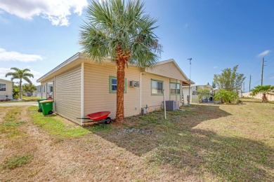 This charming 2-bedroom, 2-bathroom home is situated on a on Maple Leaf Golf and Country Club in Florida - for sale on GolfHomes.com, golf home, golf lot