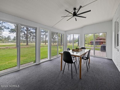 Take a tour of this inviting, gorgeously renovated home with a on The Pines At Elizabeth City in North Carolina - for sale on GolfHomes.com, golf home, golf lot