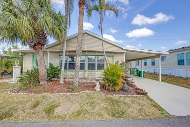 This charming 2-bedroom, 2-bathroom home is situated on a on Maple Leaf Golf and Country Club in Florida - for sale on GolfHomes.com, golf home, golf lot