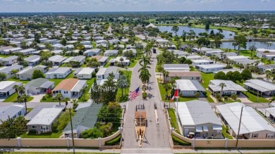 This charming 2-bedroom, 2-bathroom home is situated on a on Maple Leaf Golf and Country Club in Florida - for sale on GolfHomes.com, golf home, golf lot