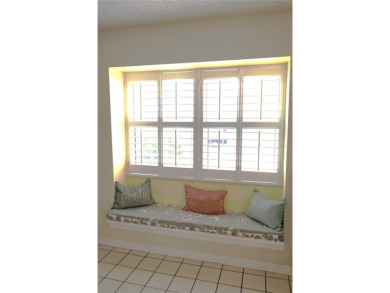 This condo is located in Kings Point, a gated active adult on Falcon Watch Golf Club in Florida - for sale on GolfHomes.com, golf home, golf lot