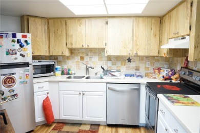 This condo is located in Kings Point, a gated active adult on Falcon Watch Golf Club in Florida - for sale on GolfHomes.com, golf home, golf lot