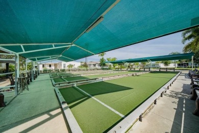 This charming 2-bedroom, 2-bathroom home is situated on a on Maple Leaf Golf and Country Club in Florida - for sale on GolfHomes.com, golf home, golf lot