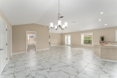 This may be the DESIGNER Concrete Block home priced under $400K on Pelican and Heron Golf Course in Florida - for sale on GolfHomes.com, golf home, golf lot