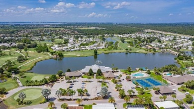 This charming 2-bedroom, 2-bathroom home is situated on a on Maple Leaf Golf and Country Club in Florida - for sale on GolfHomes.com, golf home, golf lot