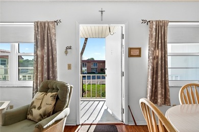 Welcome to effortless Florida living in this beautifully on The American Golf Club in Florida - for sale on GolfHomes.com, golf home, golf lot