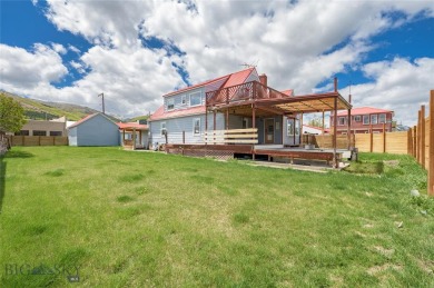 Discover this spacious 5-bedroom, 3-bathroom home nestled in the on The Old Works Golf Course in Montana - for sale on GolfHomes.com, golf home, golf lot