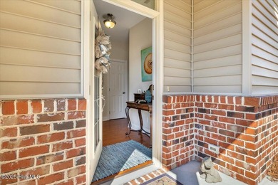 Experience coastal living in this meticulously maintained on South Harbour Golf Links in North Carolina - for sale on GolfHomes.com, golf home, golf lot