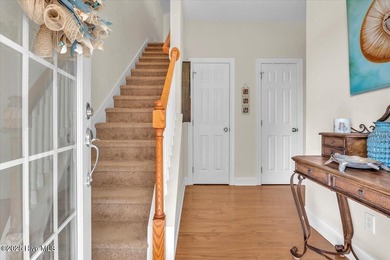 Experience coastal living in this meticulously maintained on South Harbour Golf Links in North Carolina - for sale on GolfHomes.com, golf home, golf lot