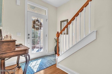 Experience coastal living in this meticulously maintained on South Harbour Golf Links in North Carolina - for sale on GolfHomes.com, golf home, golf lot