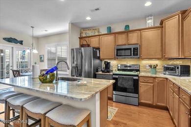 Experience coastal living in this meticulously maintained on South Harbour Golf Links in North Carolina - for sale on GolfHomes.com, golf home, golf lot