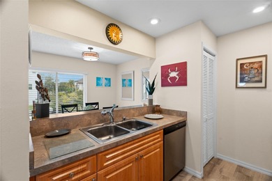 Welcome to this beautifully updated, turnkey second-floor 2 on Tarpon Springs Golf Course in Florida - for sale on GolfHomes.com, golf home, golf lot