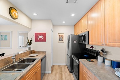 Welcome to this beautifully updated, turnkey second-floor 2 on Tarpon Springs Golf Course in Florida - for sale on GolfHomes.com, golf home, golf lot