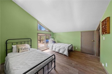 Experience the best of cabin comfort and modern design in this on Voyager Village Country Club - Voyager in Wisconsin - for sale on GolfHomes.com, golf home, golf lot
