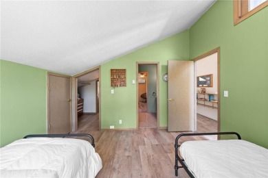 Experience the best of cabin comfort and modern design in this on Voyager Village Country Club - Voyager in Wisconsin - for sale on GolfHomes.com, golf home, golf lot