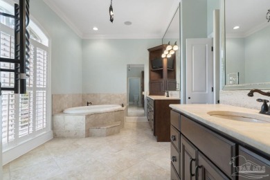 Discover this beautiful 5-bedroom, 5-bath single-family home on Tiger Point Golf and Country Club in Florida - for sale on GolfHomes.com, golf home, golf lot