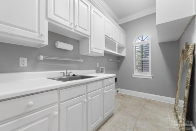 Discover this beautiful 5-bedroom, 5-bath single-family home on Tiger Point Golf and Country Club in Florida - for sale on GolfHomes.com, golf home, golf lot