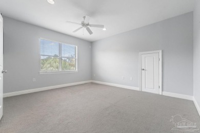 Discover this beautiful 5-bedroom, 5-bath single-family home on Tiger Point Golf and Country Club in Florida - for sale on GolfHomes.com, golf home, golf lot